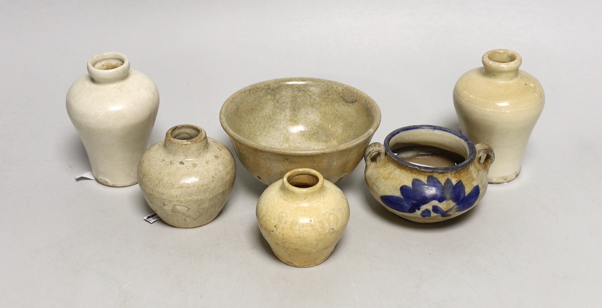 A group of Chinese blanc de chine small jars, Fujian kilns, 15th - 17th century and other vessels, tallest 9.5 cm